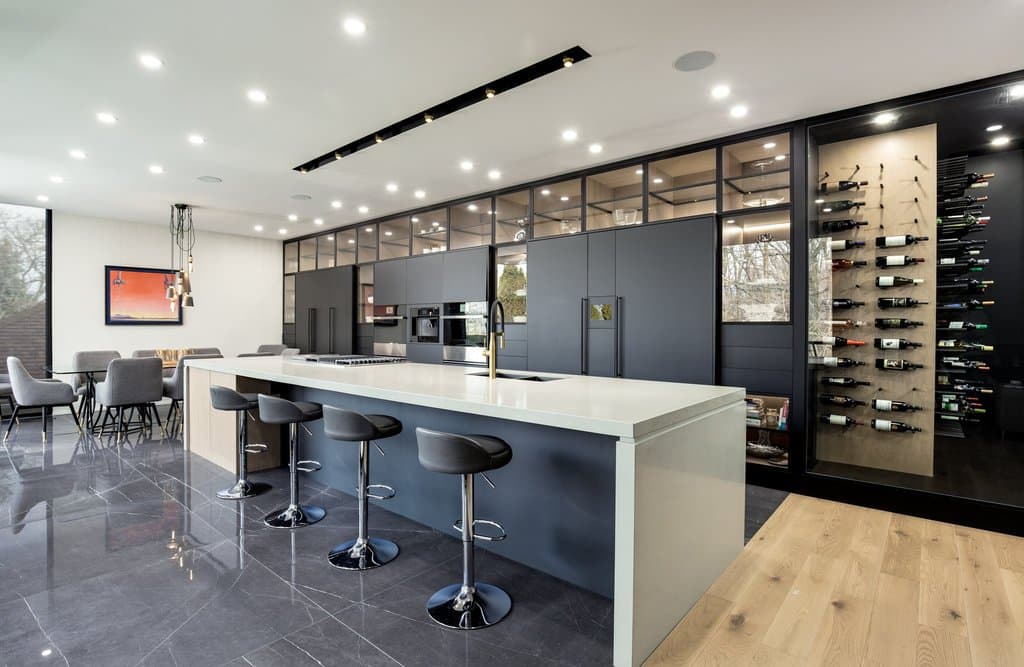 A kitchen with a wine cellar attached